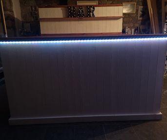 Custom built bar and back bar with lights